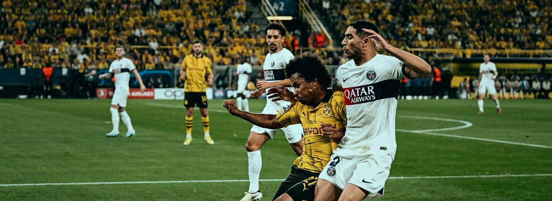 Borussia Dortmund celebrate 1-0 victory in first leg